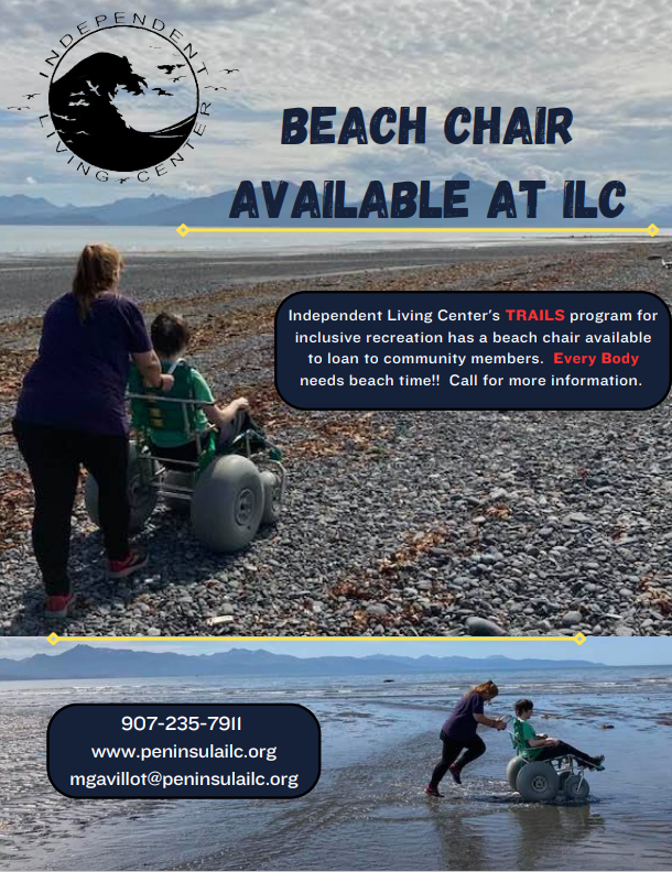 TRAILS advocates pushing each other on the beach in our accessible wheelchair on a sunny day.